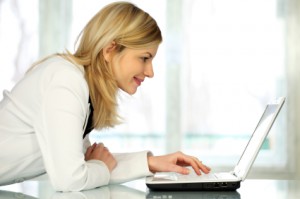 Woman with laptop.